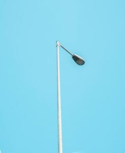 Street lighting with a blue sky background