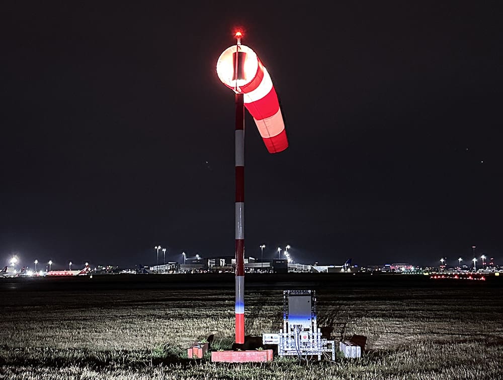 Internally lit windsock mast at Heathrow Airport